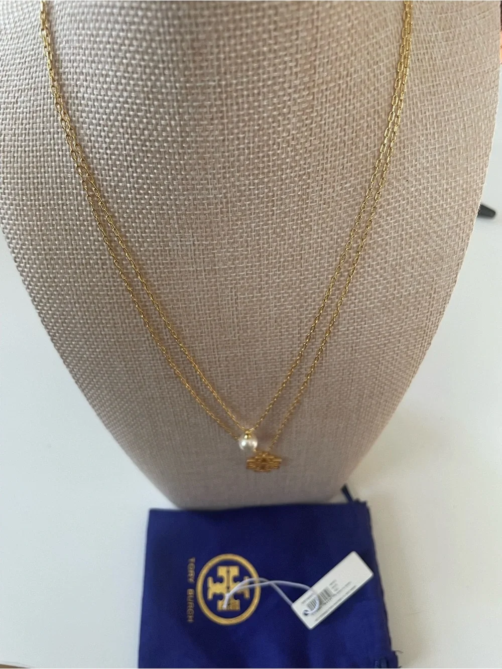 Tory Burch Gold Layered Necklace with White Pearl and Logo Pendant